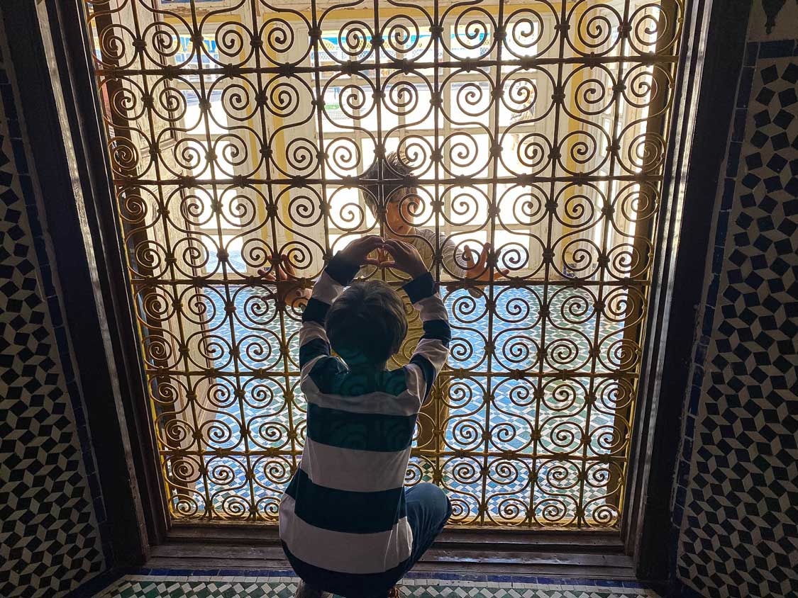 Children exploring Bahia Palace in Marrakech