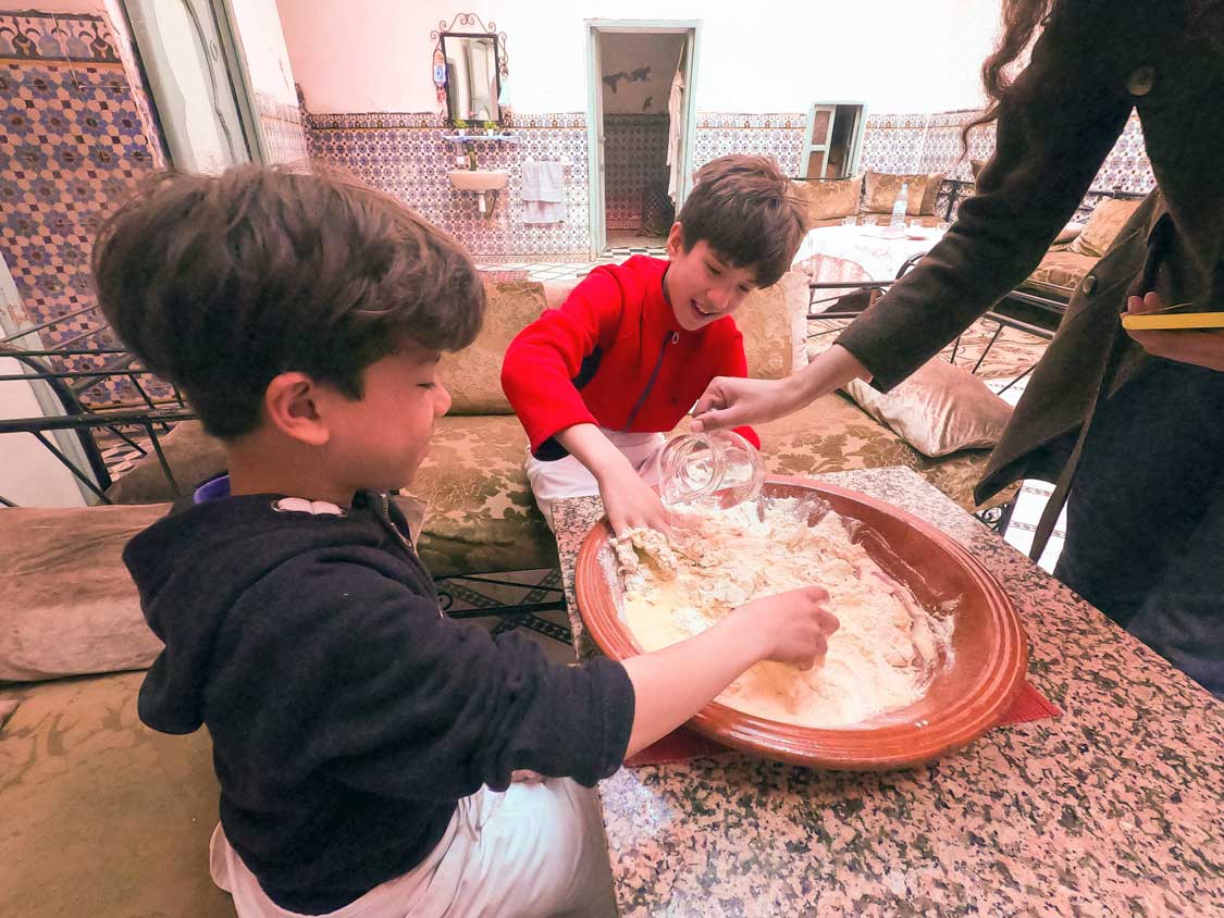 Kids in Morocco enjoyoing a Moroccan cooking class