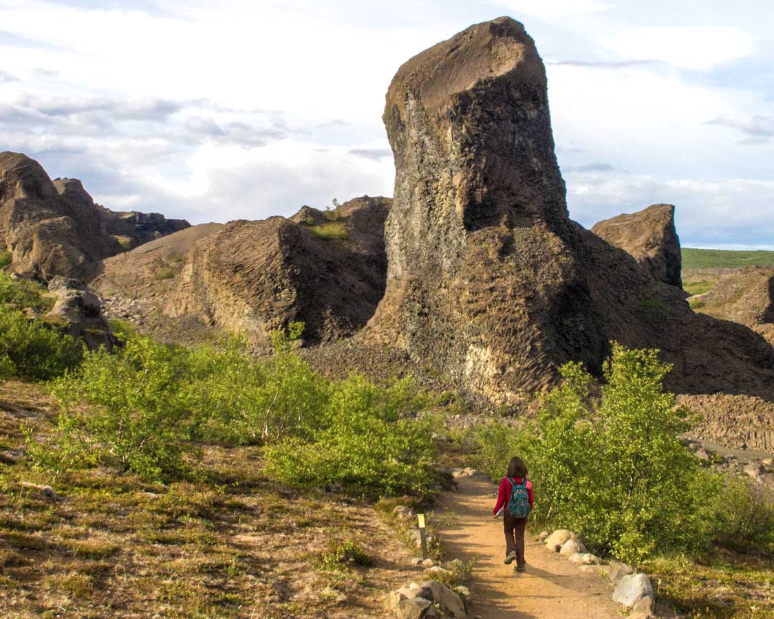 Woman hiking Dimmoborgir in Iceland