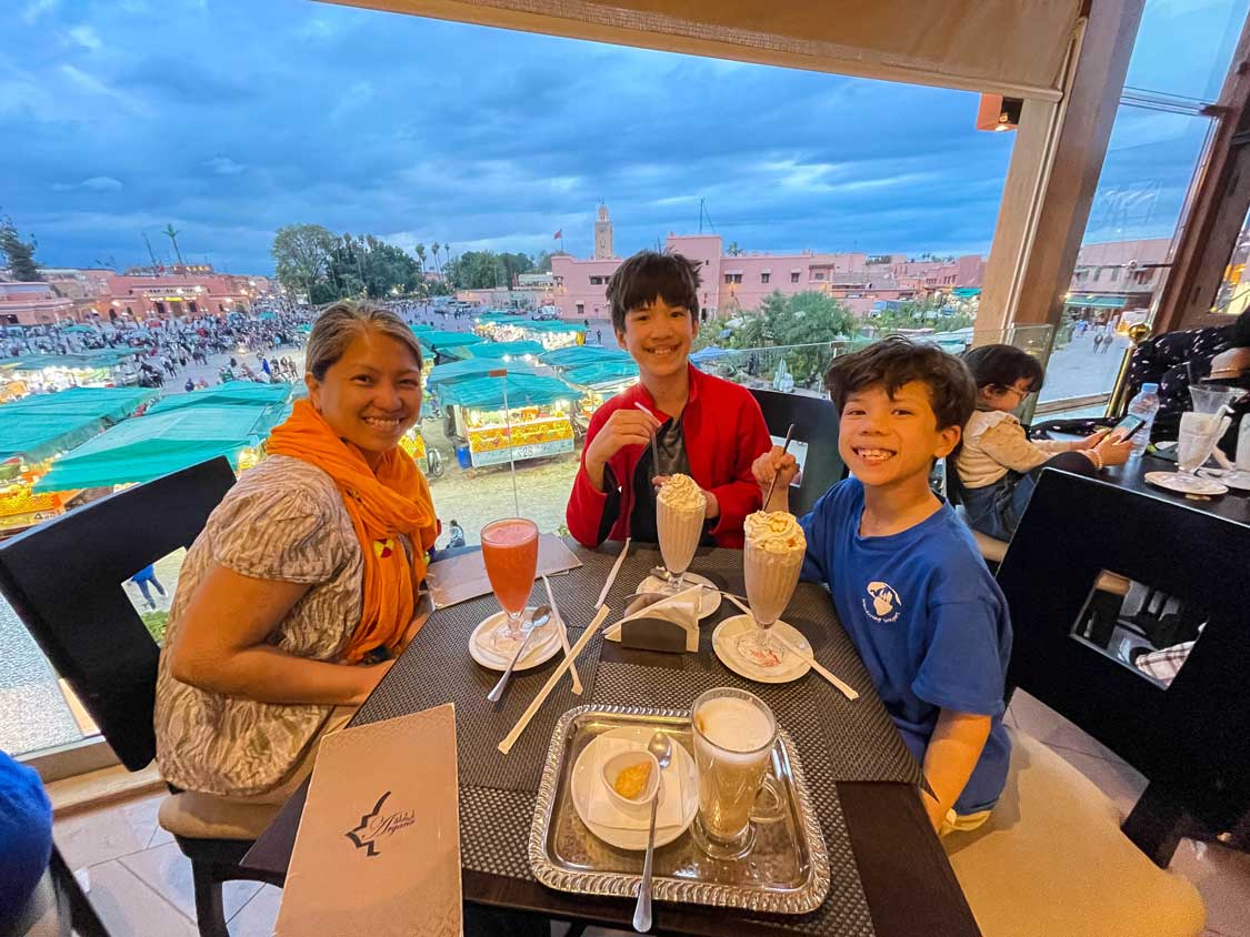 Family enjoying ice cream at Argana cafe in Marrakech, Morocco