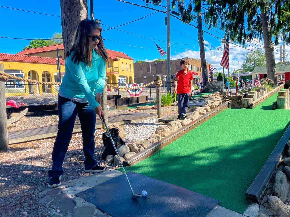 Woman at the oldest mini golf course in the US