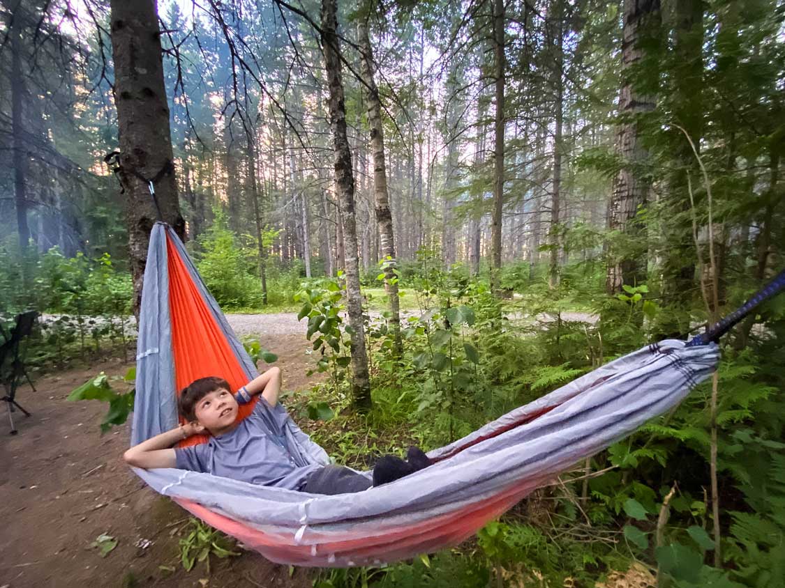 Boy in a hammock at Kap Kig Iwan Provincial Park