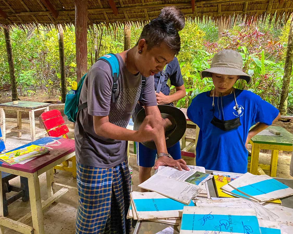 Kids learn hill tribe languages in Kanchanaburi, Thailand