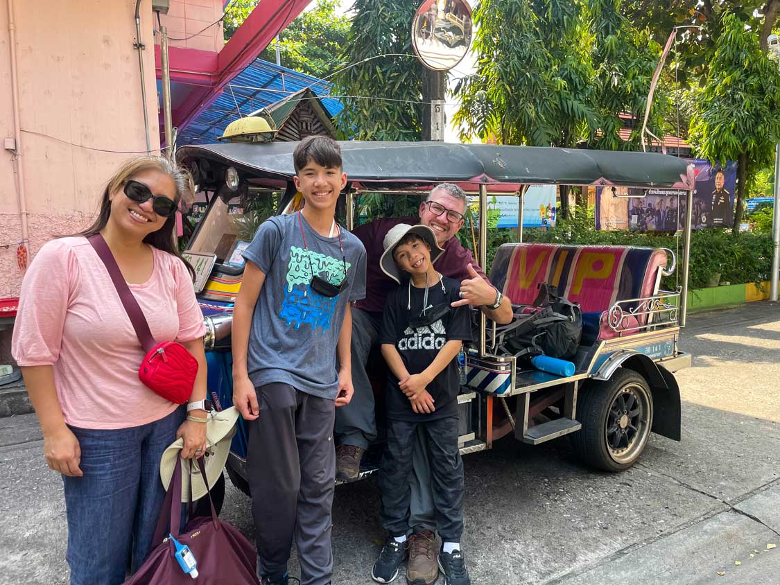 Family with a tuk-tuk in Bangkok