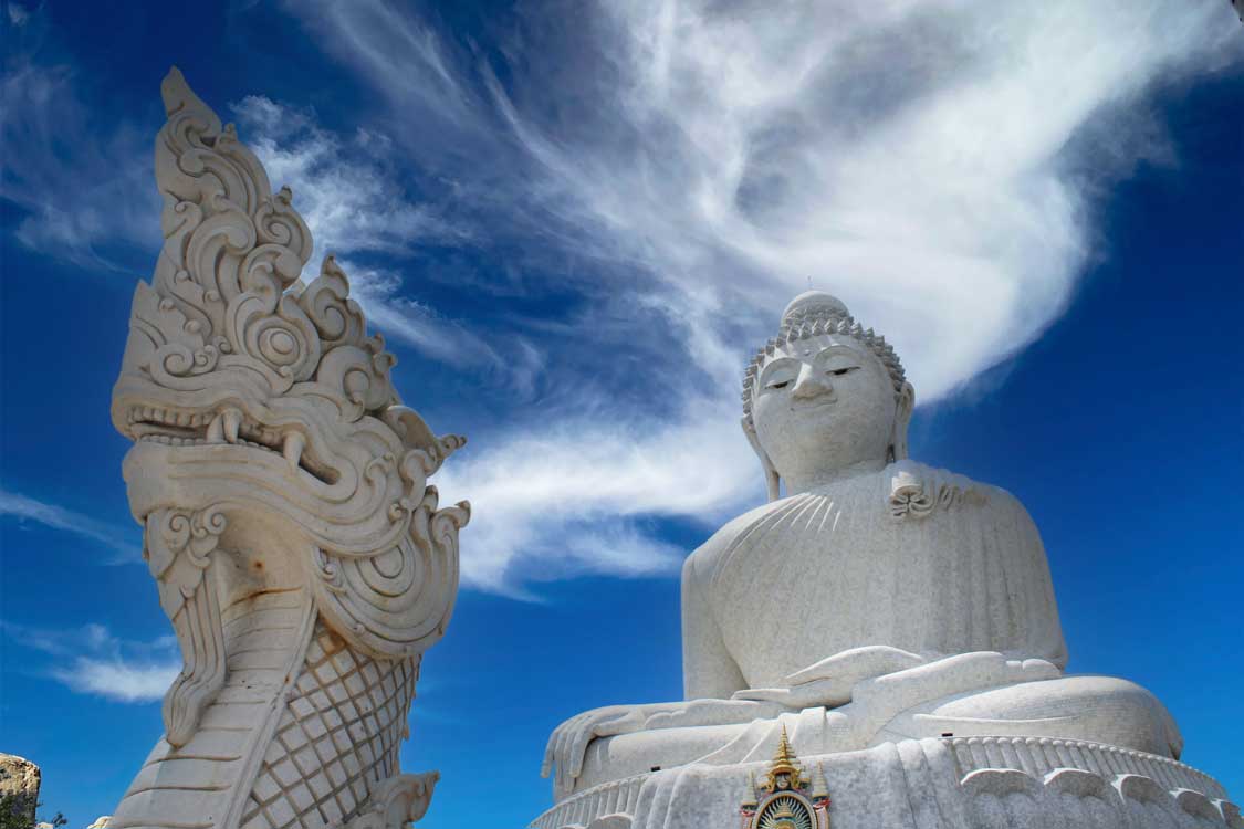 Big Buddha in Phuket Thailand under a blue sky