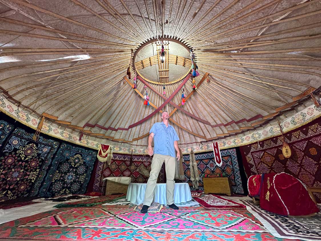 A man looks around inside a nomadic yurt at the Hun Ethno-Village near Almaty, Kazakhstan