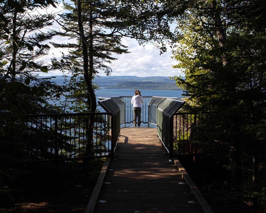 A woman looks out from the Thunder Bay Lookout in Sleeping Giant Provincial Park
