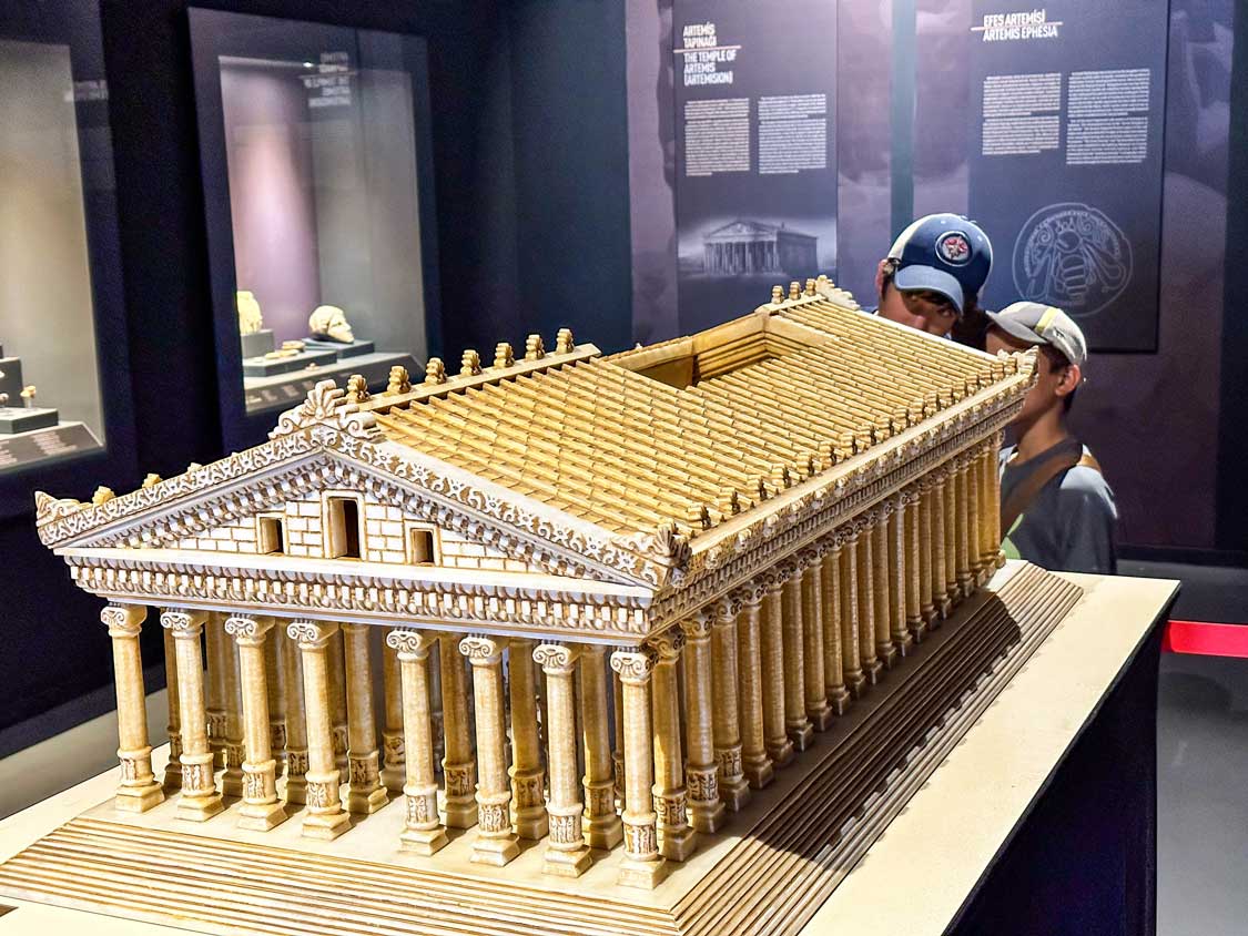 Two boys look into a scale model of the Temple of Artemis at the Ephesus Archeological Museum
