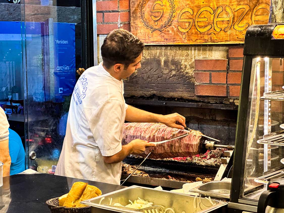 A chef cooks Kebab at a doner house in Turkiye