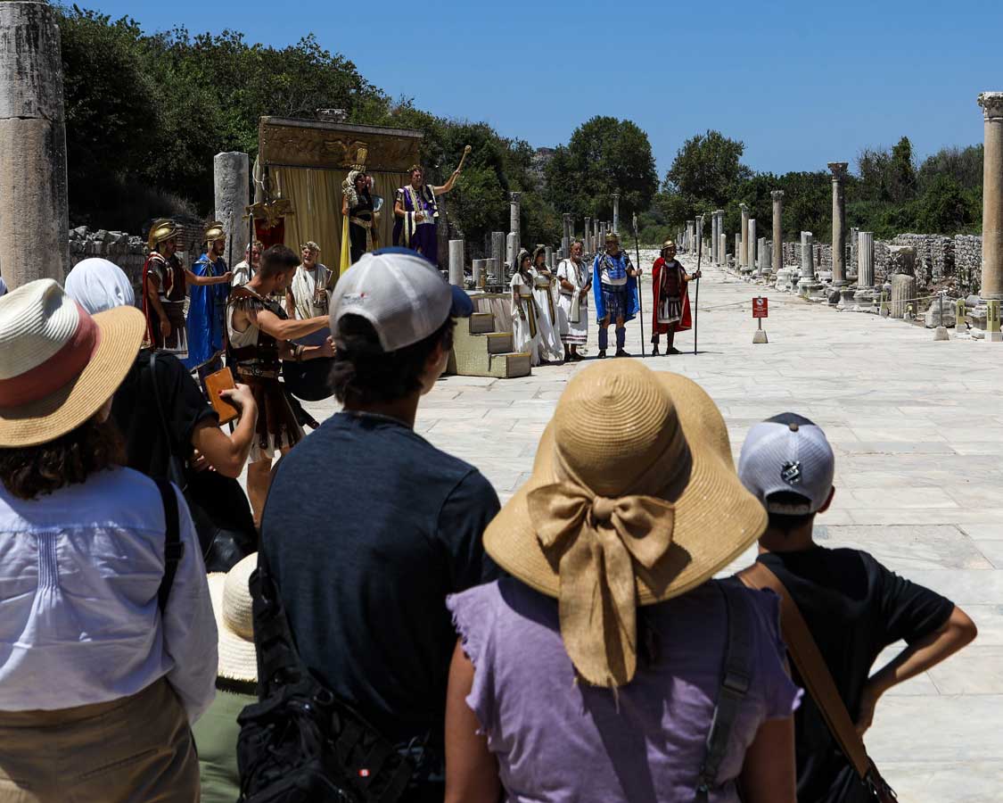 Actors at Ephesus perform a play along Arcadiane Street