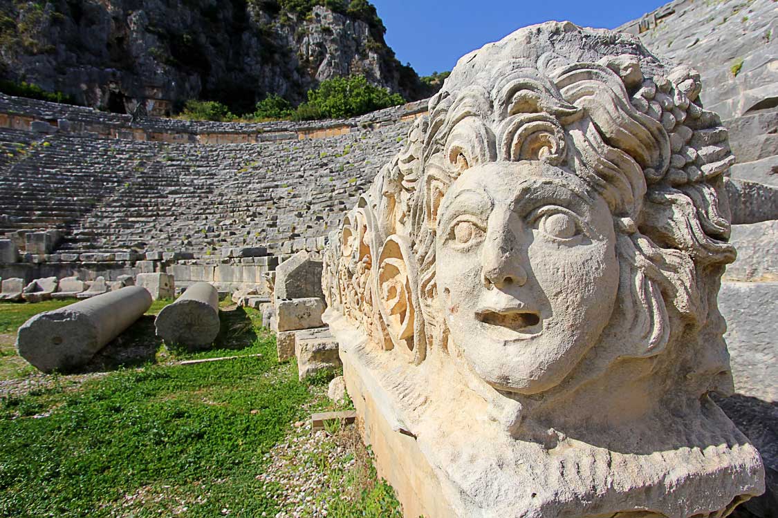 A marble statue among the ruins of the amphitheater at the Myra Ruins in Demre