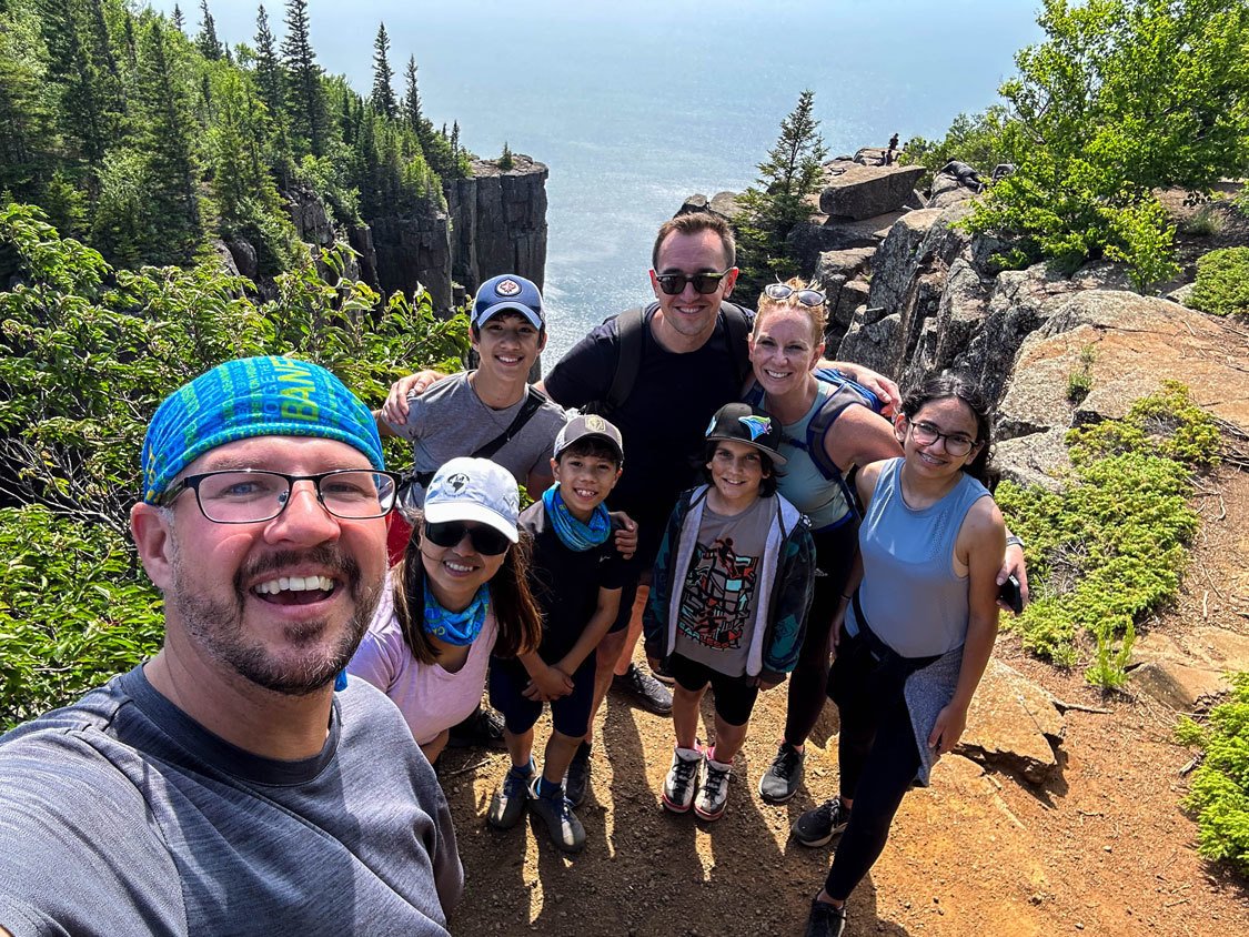 A group of hikers pose for a photo at the gorge lookout in Sleeping Giant Provincial Park