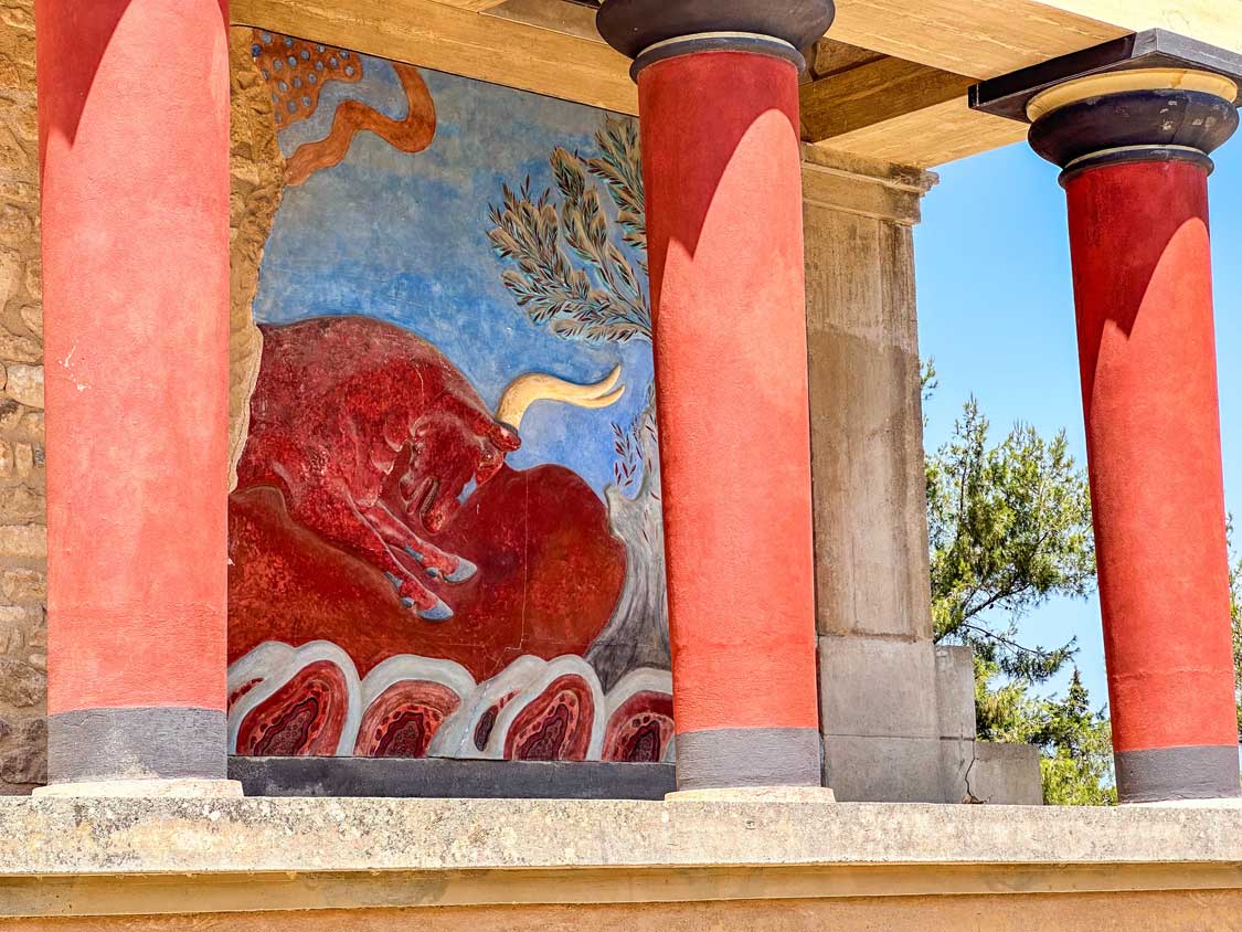 A stunningly vibrant painting of a bull on the walls of the Palace of Knossos on the island of Crete