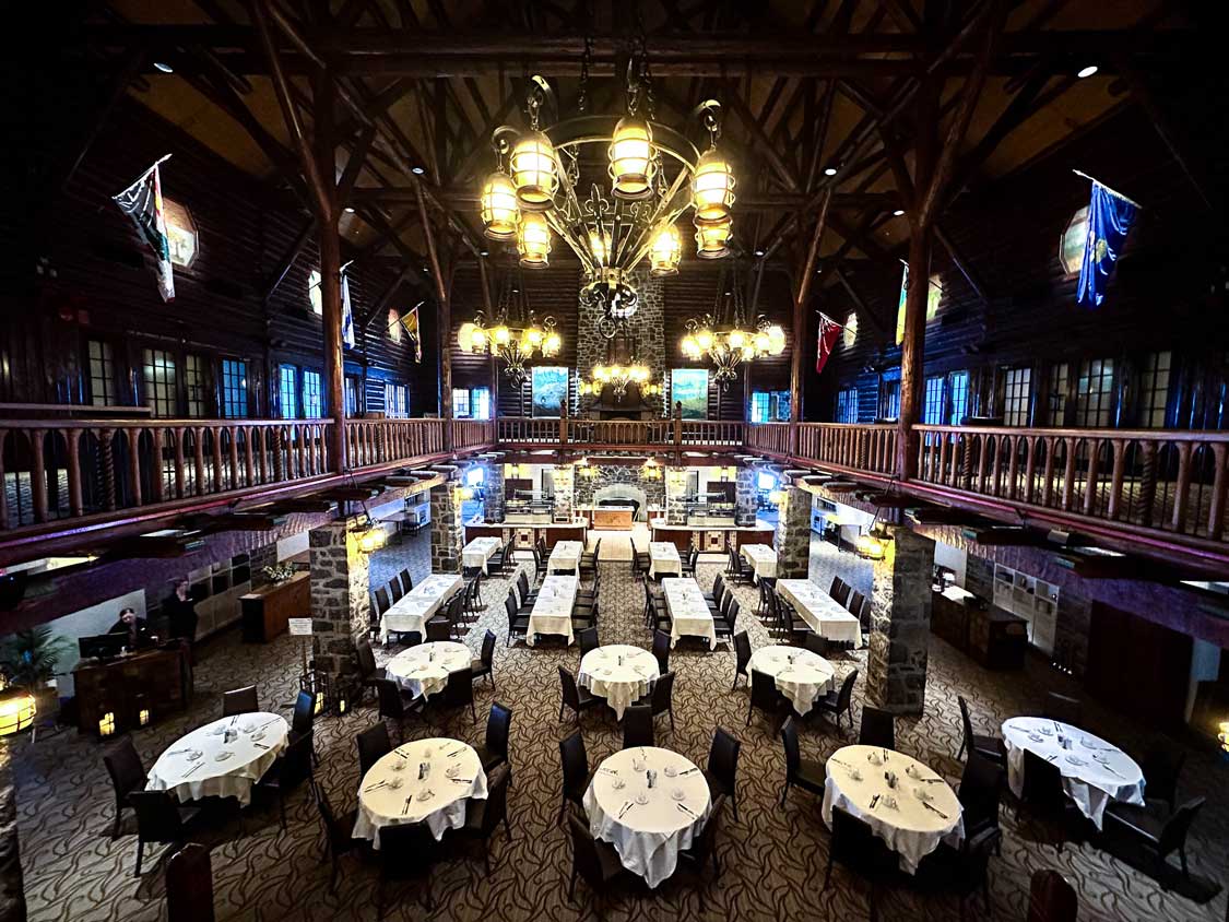 A grand dining room at Aux Chantignoles in the Fairmont Le Chateau Montebello