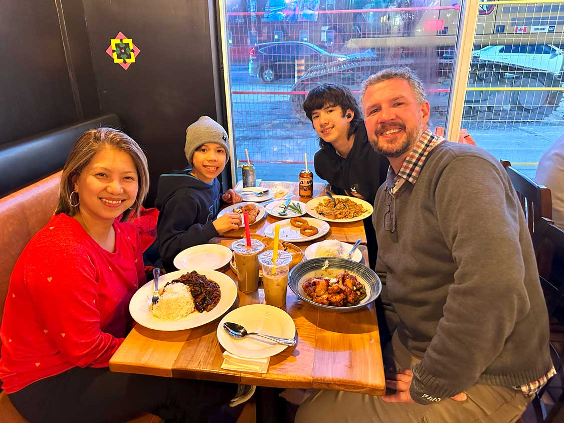 Family eating at More Thai Restaurant in Mississauga