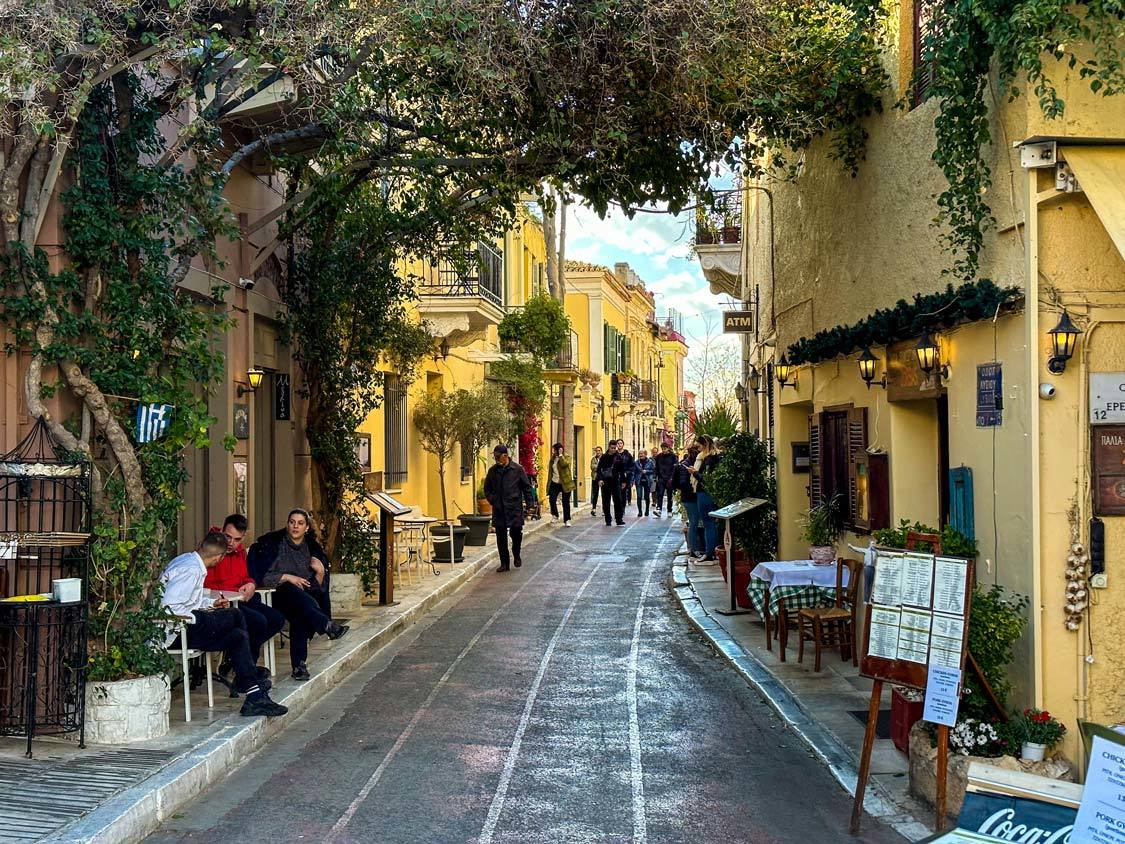 A shade tree creates a scenic tunnel on Tripodon Street, the oldest street in Europe