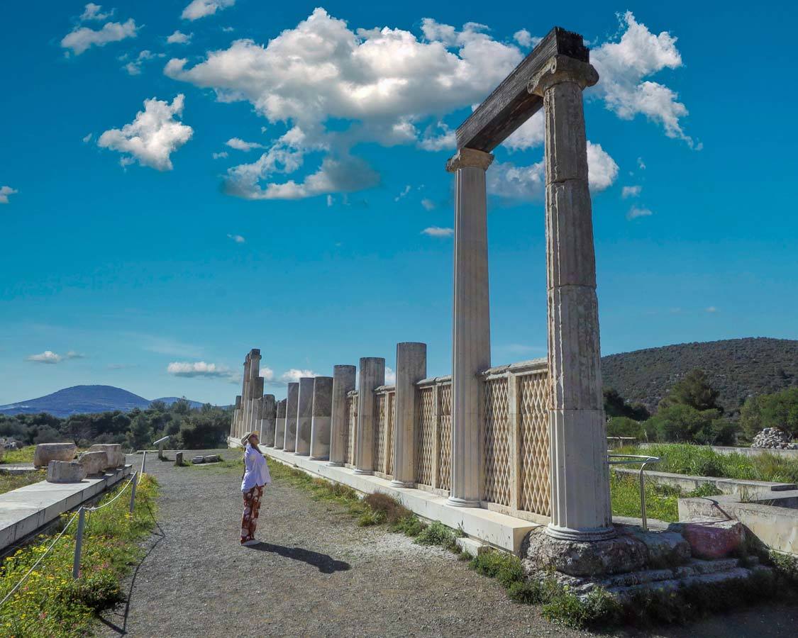 Christina Wagar looks up at the Stoa of Abaton in Epidaurus, Greece