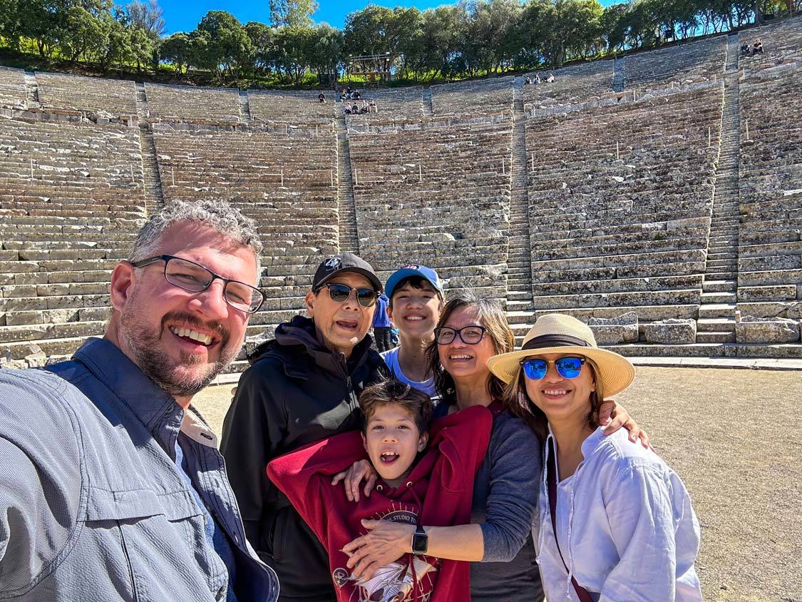 Kevin Wagar and his family pose for a photot in the Epidaurus Theater