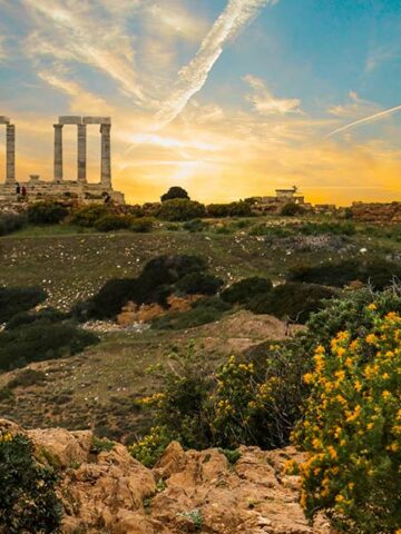 Visiting the Temple of Poseidon in Cape Sounio, Greece at sunset