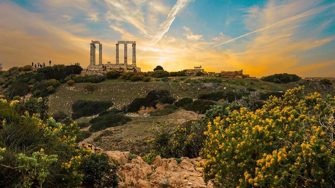 Visiting the Temple of Poseidon in Cape Sounio, Greece at sunset