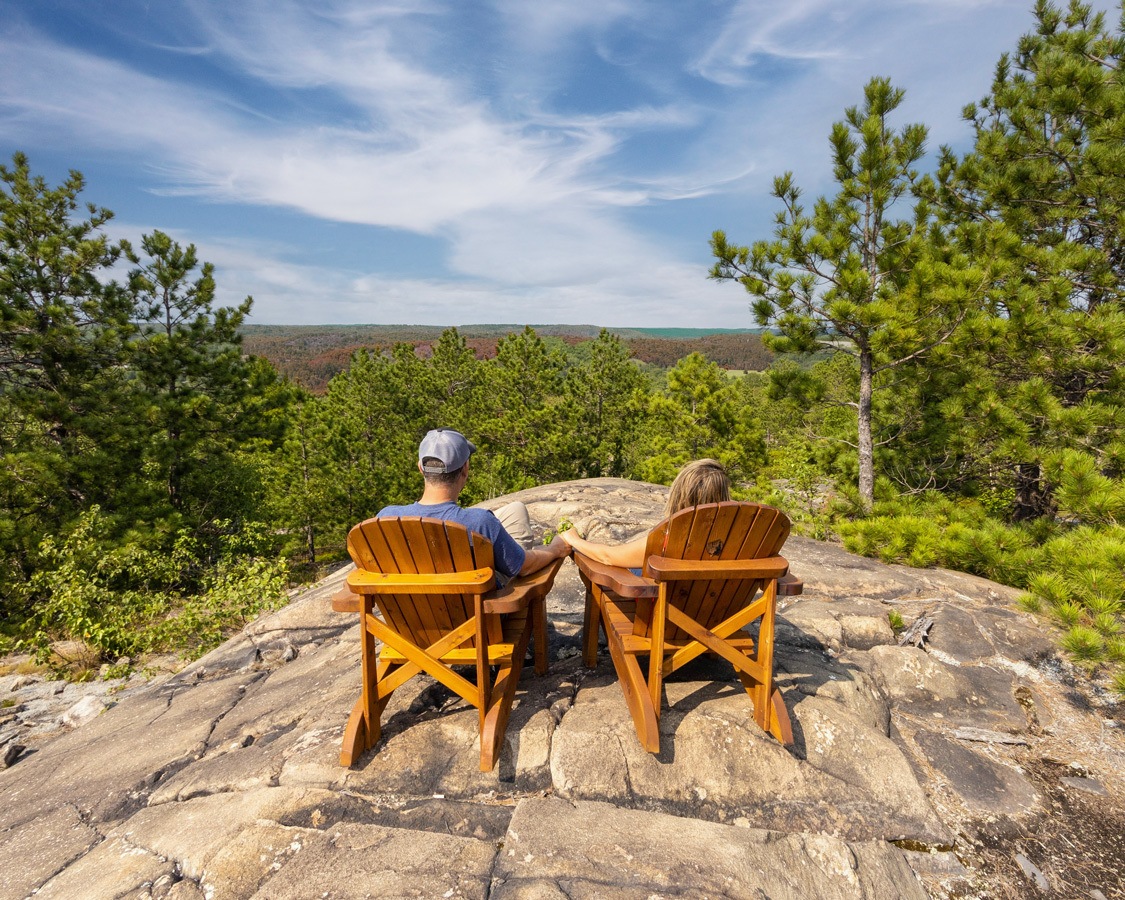 Kevin and Christina Wagar look at the fall colors from a viewpoint in Kivi Park