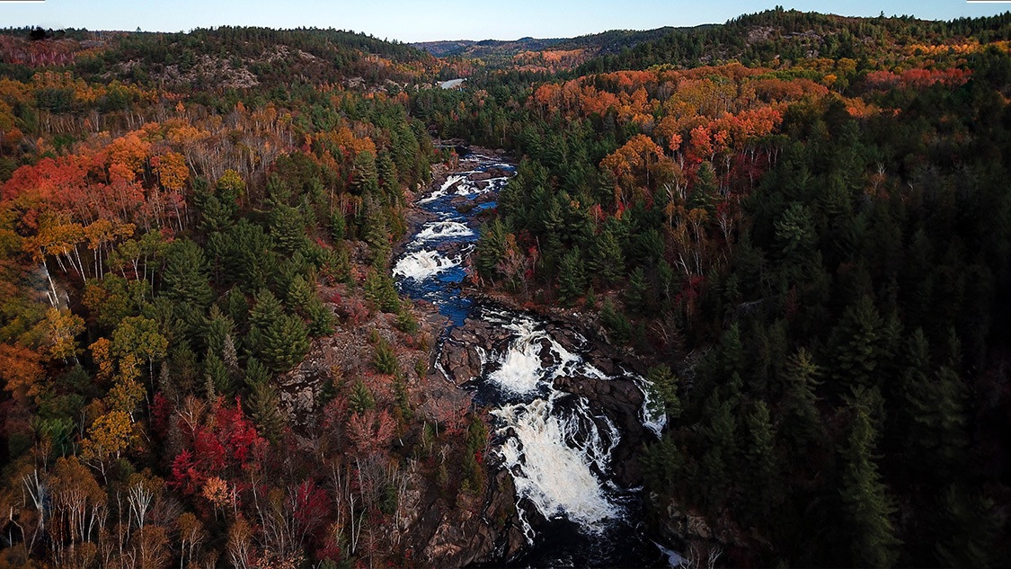 Onaping Falls cascades through the fall colors in Sudbury, Ontario