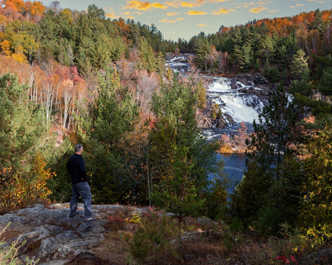 Kevin Wagar hikes to the Onaping Falls overlook near AY Jackson Lookout