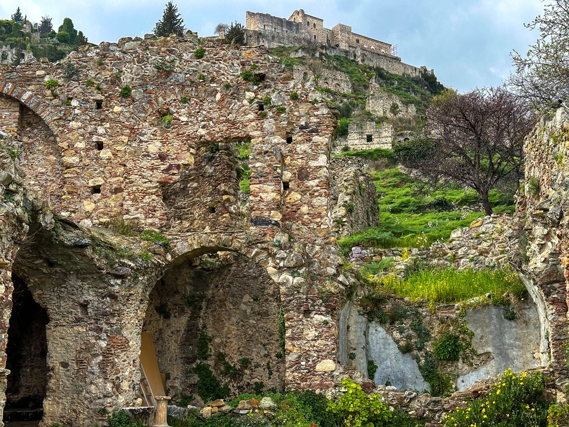 Arches and crumbling walls in Mystras, Greece