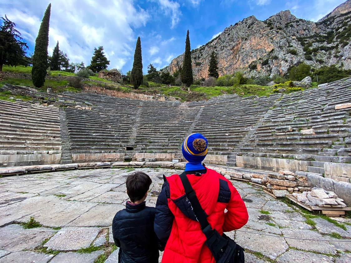 Two boys explore the Ancient Theater of Delphi