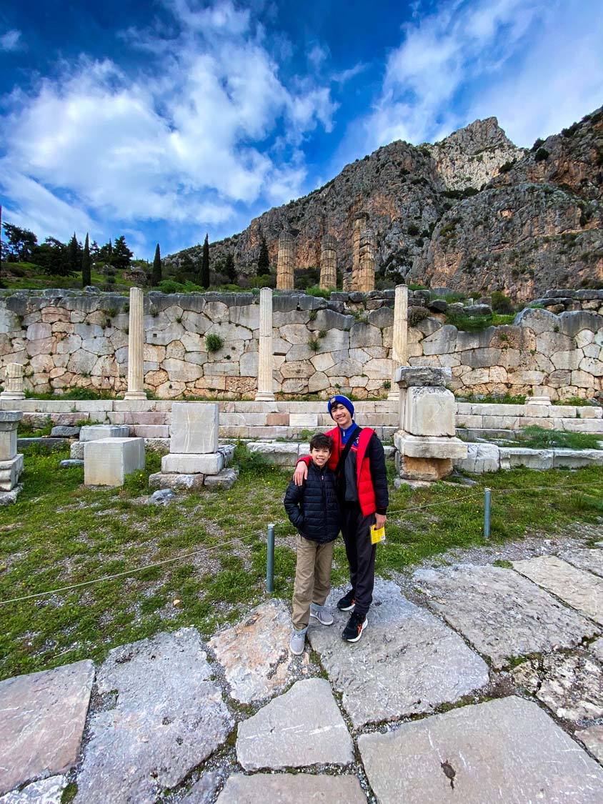 Two boys pose for the camera while exploring the Delphi Gymnasium