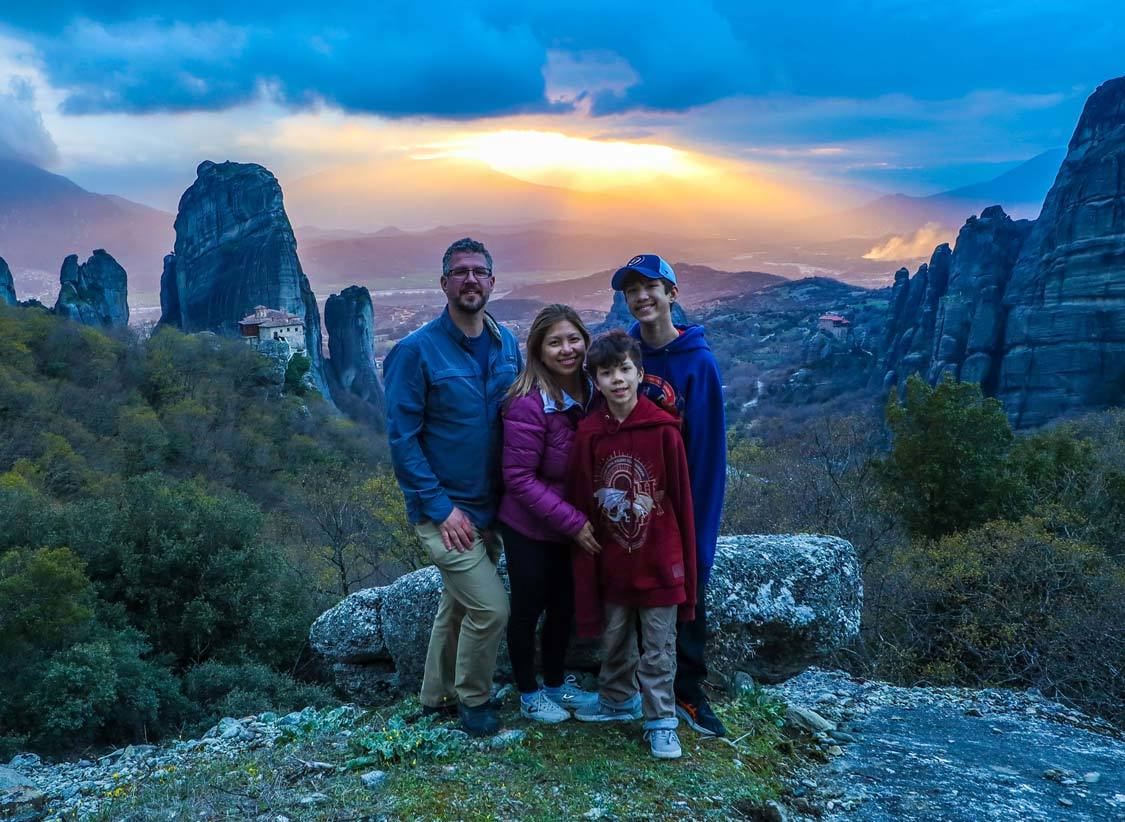 Kevin Wagar and his family pose for a sunset photo in Meteora Greece