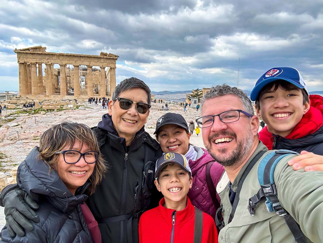 An interacial, multi-generational travel family at the Acropolis in ancient Greece