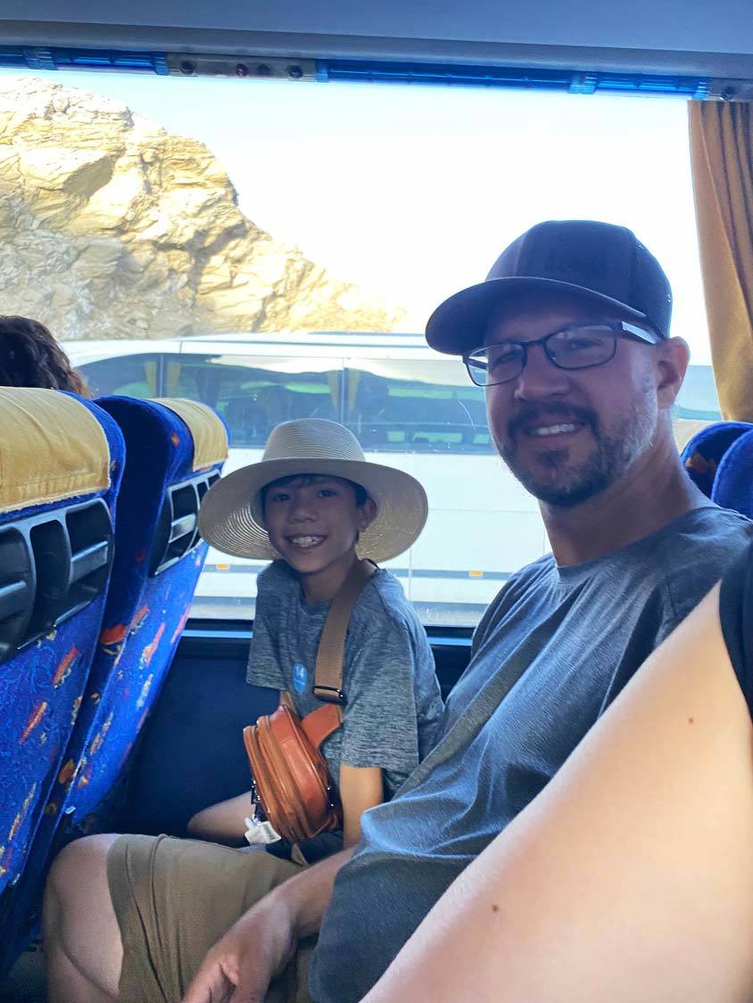 Kevin and Dylan Wagar board the bus on their Santorini day tour