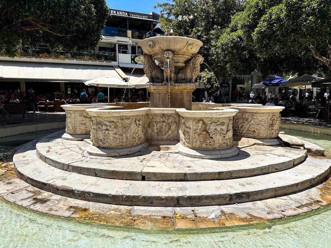 Five lions top a round fountain in the center of Heraklion, Greece