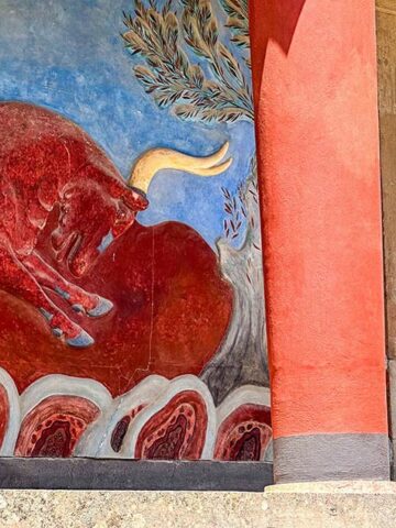 Frescoe of a red bull at the Palace of Knossos during one day in Heraklion