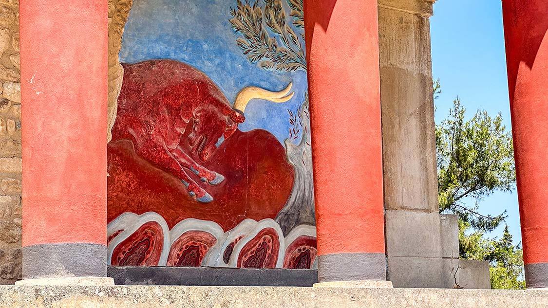 Frescoe of a red bull at the Palace of Knossos during one day in Heraklion