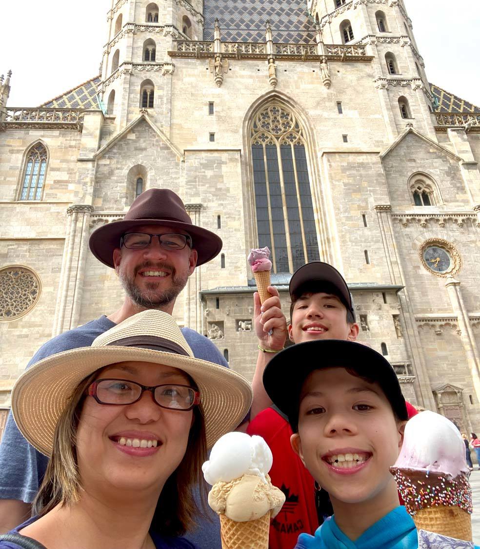 A family shows off their ice cream treats in Vienna, Austria