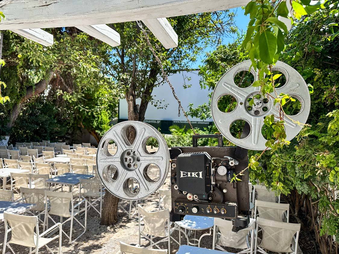 An antique film projector at an outdoor movie theater on Mykonos, Greece