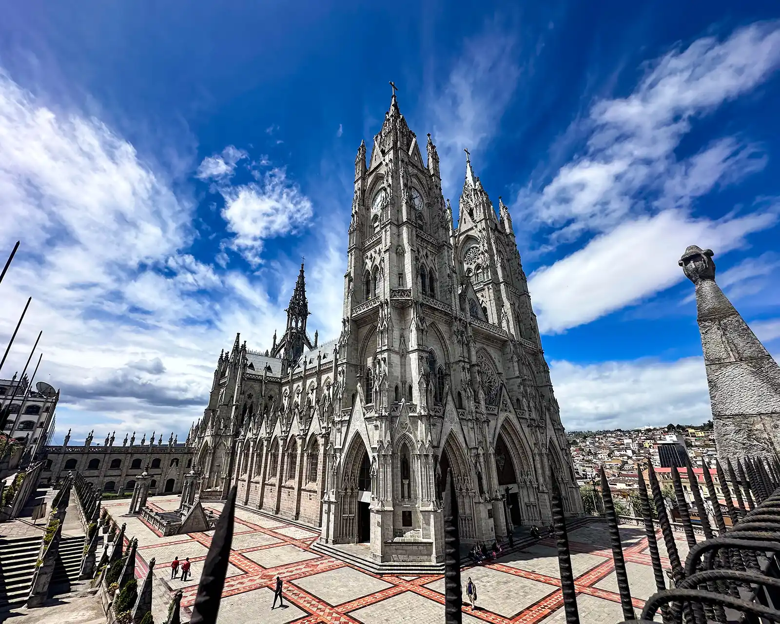 Elegant church Basilica del Voto Nacional against a blue sky