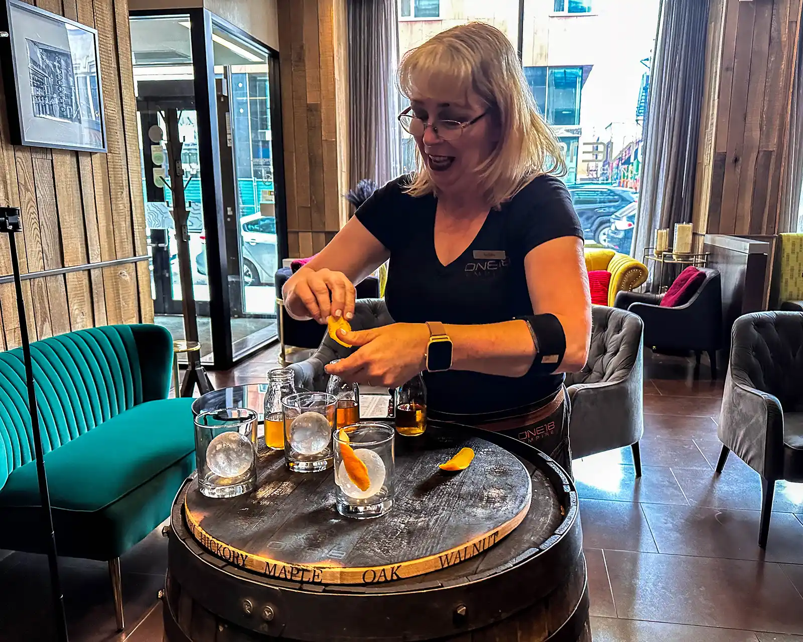 Bartender at One18 Empire crafts create-your-own old fashionds
