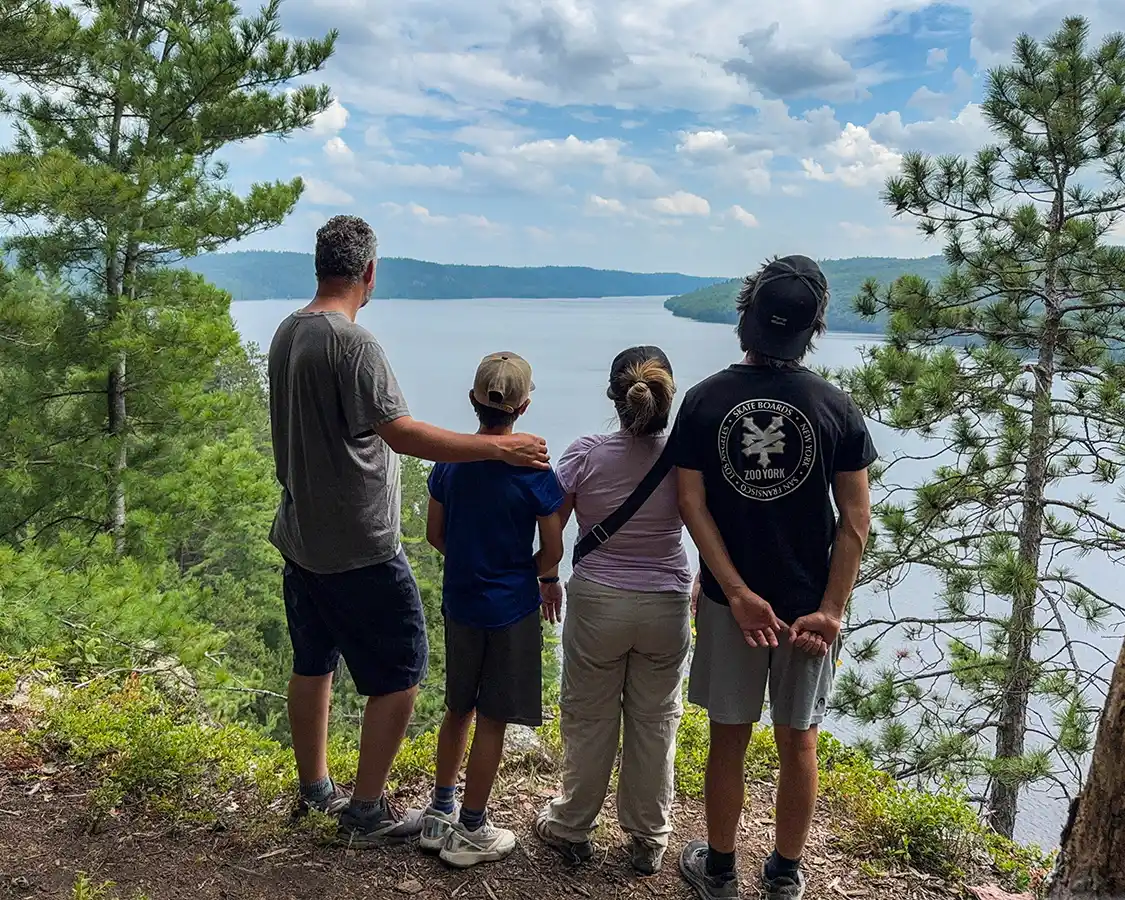 Family hiking the Des Piers hiking trail in Temiscamingue, Quebec