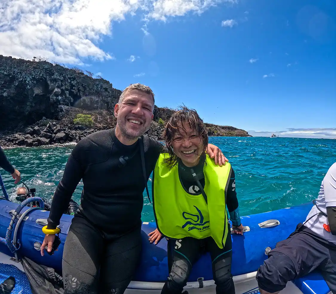 Kevin Wagar poses with his mother-in-law Maria while snorkeling in the Galapagos Islands