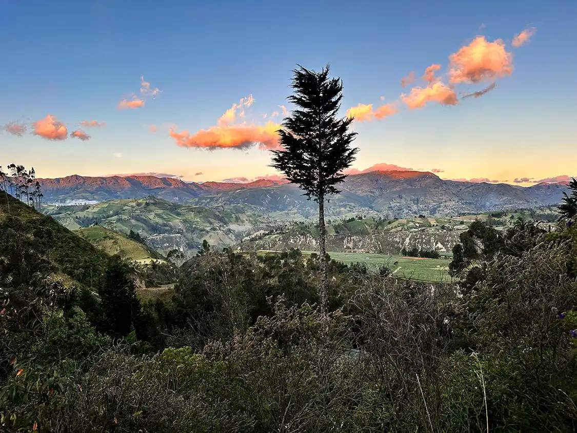 Sunset over the Andean mountains from atop the Black Sheep Inn hotel in Quilotoa, Ecuador
