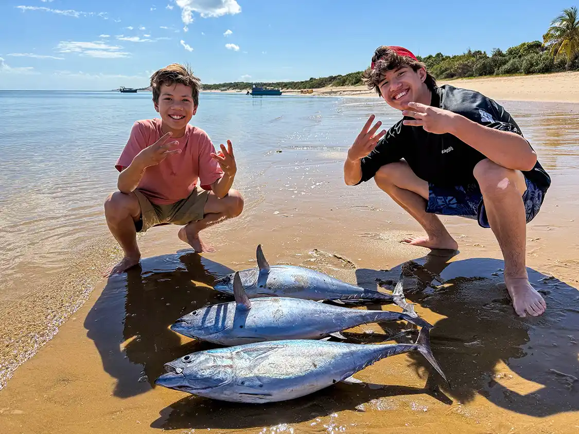 Cohen and Dylan Wagar pose with wild tuna they caught while fishing in Bazaruto Island Mozambique