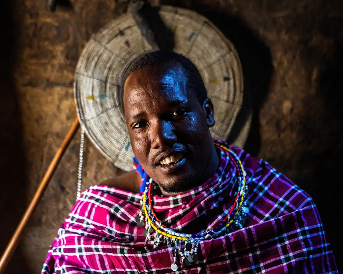 Maasai tribesman in his home
