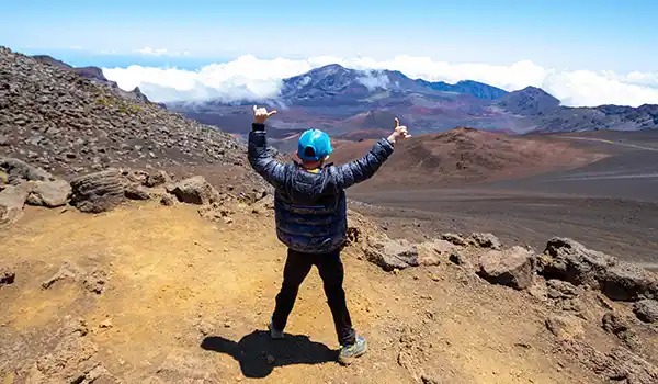 Boy hiking in a Hawaii Canyon USA Family Travel Widget