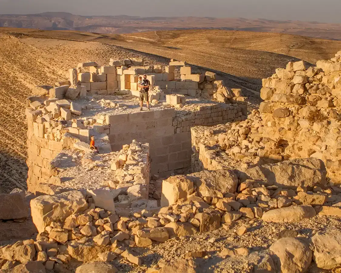 A family wanders through the ruins of Karak castle in Jordan