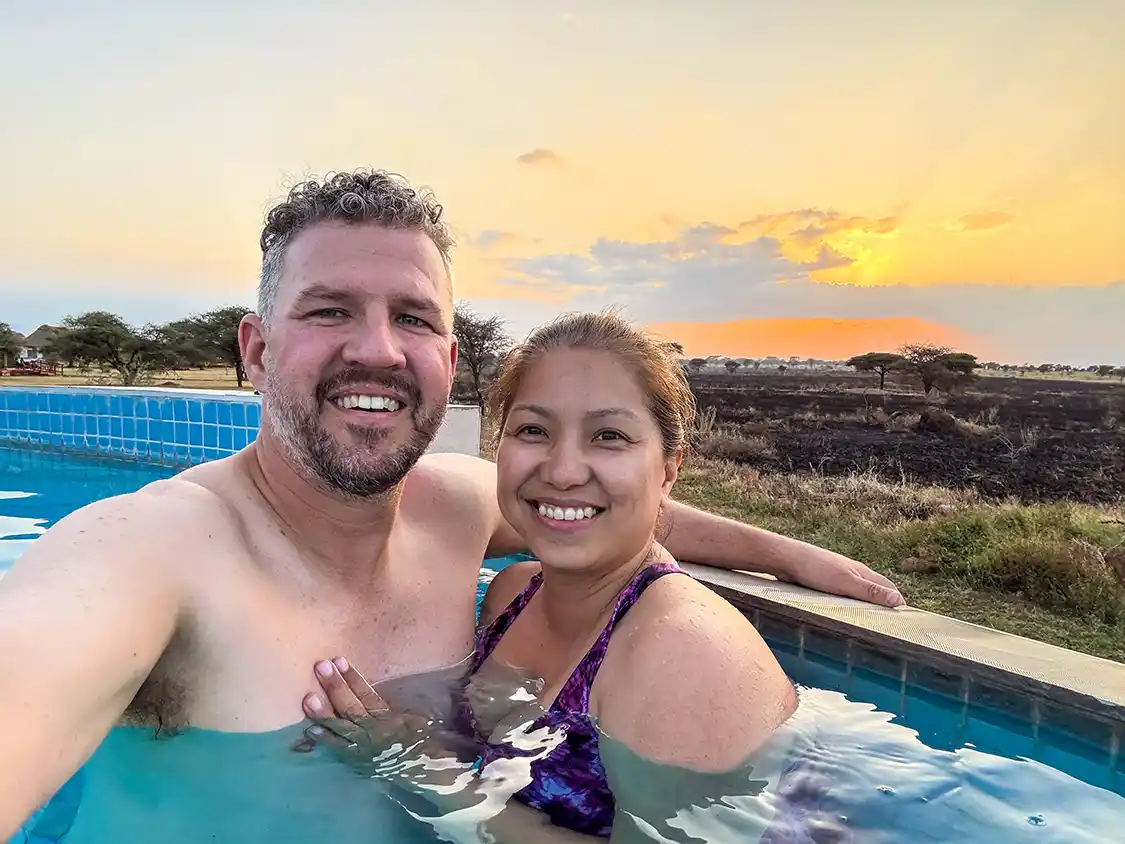 Christina and Kevin Wagar enjoying a sunset swim at Olkarien Lodge in Serengeti National Park