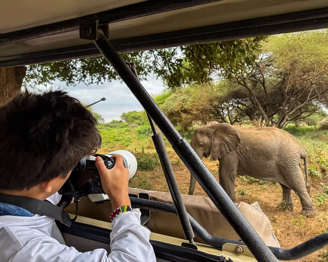 Dylan Wagar photographs an elephant in Lake Manyara NP