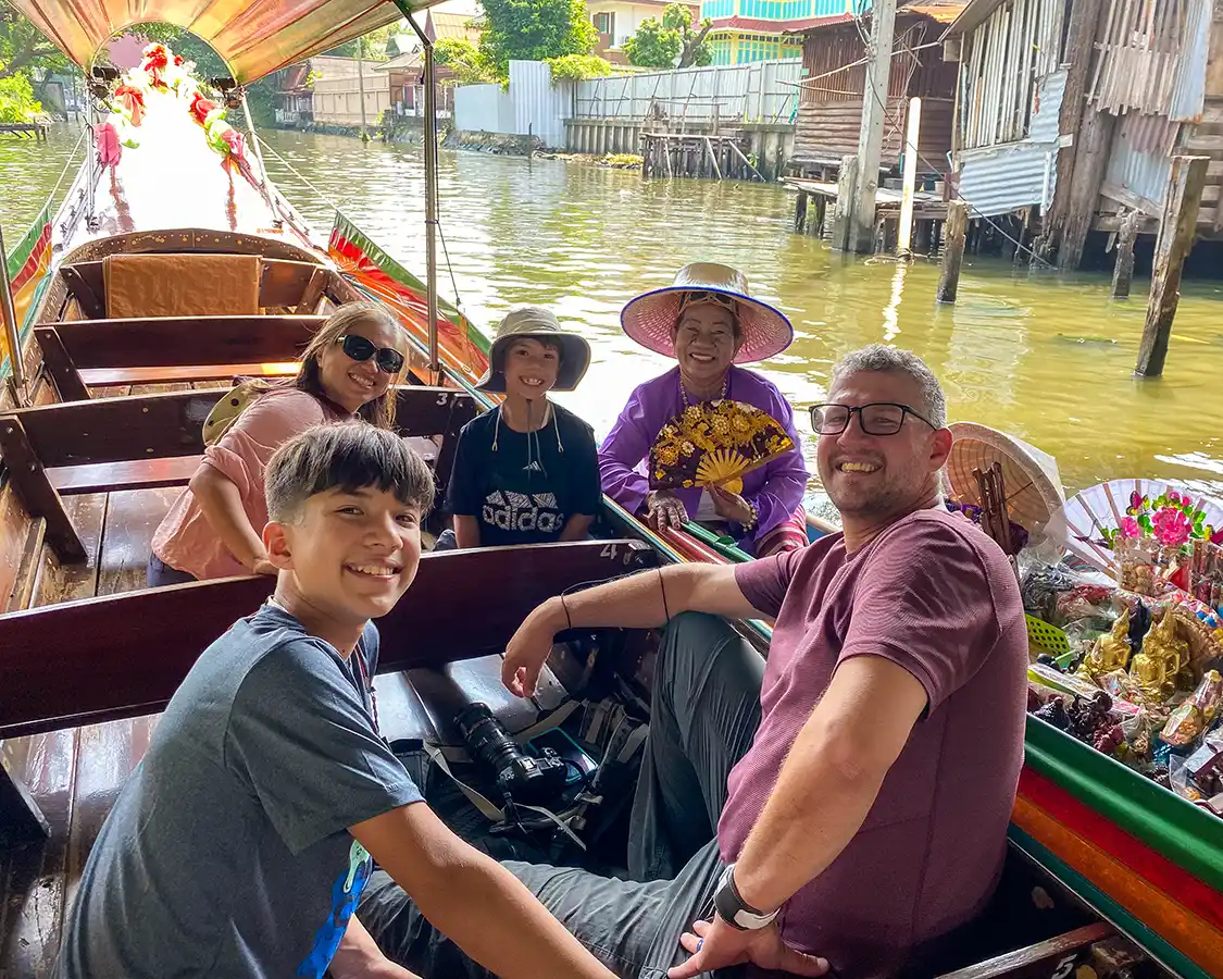 family using unlimited eSIM data for translation in Bangkok Thailand